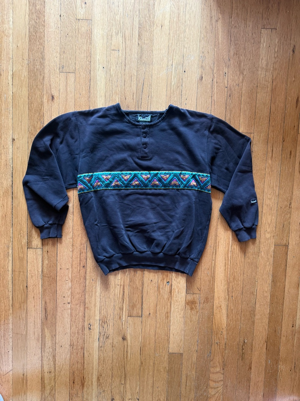 Vintage-Style Black Crewneck Sweater with Multicolor Geometric Band